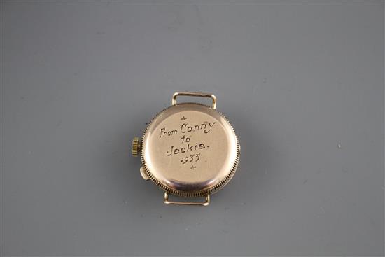 A ladys 1930s yellow metal (stamped 9c) Golfball? manual wind wristwatch, with hinged cover, no strap,